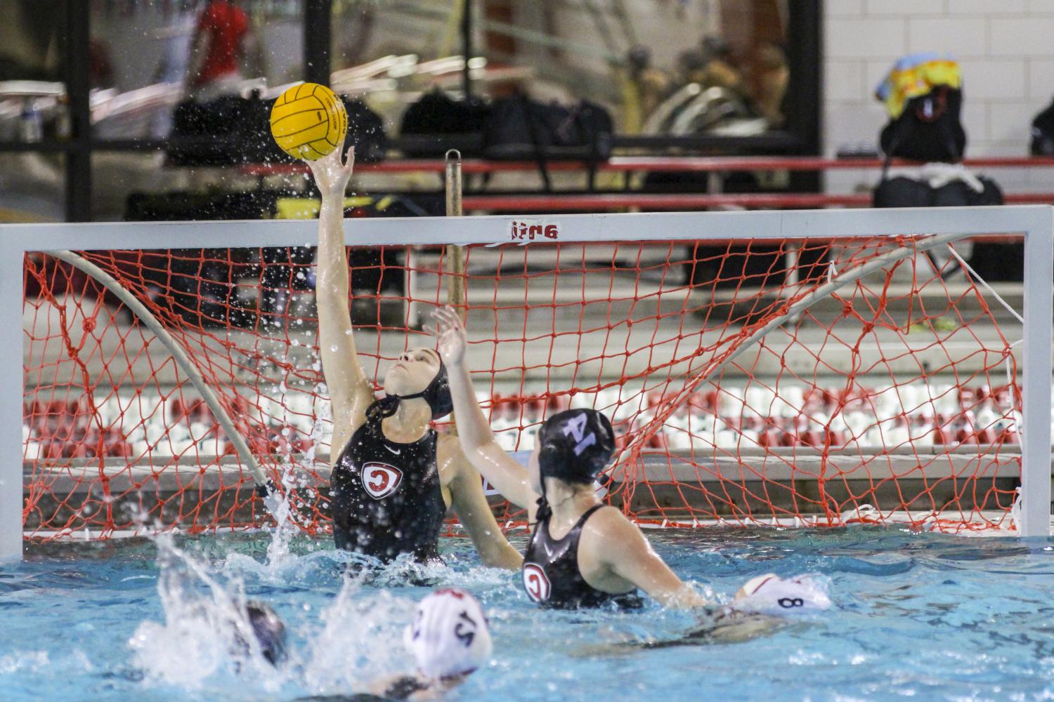 <a href='http://oct.cl0907.com'>BETVLCTOR伟德登录</a> student athletes compete in a water polo tournament on campus.